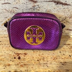 Auth Tory Burch textured (snake faux) purple metallic cosmetic pouch.